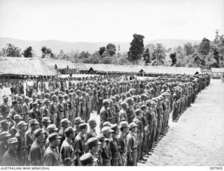 RABAUL, NEW BRITAIN. 1945-10-10. A SPECIAL PARADE AND CONCERT WAS HELD AT THE CAMP TO CELEBRATE THE 34TH ANNIVERSARY OF THE FOUNDING OF THE CHINESE REPUBLIC. MAJOR GENERAL K.W. EATHER, GENERAL ..