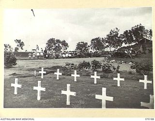 PORT MORESBY, NEW GUINEA. 1944-02-07. A GENERAL VIEW OF THE CONGREGATION AT THE REQUIEM MASS AT THE BOMANA WAR CEMETERY