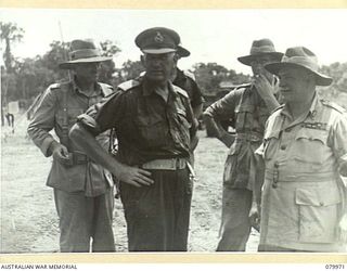 TOKO, BOUGAINVILLE, SOLOMON ISLANDS. 1945-03-26. VX1 GENERAL SIR THOMAS BLAMEY, GBE, KCB, CMG, DSO, ED, COMMANDER- IN- CHIEF, ALLIED LAND FORCES, SOUTH WEST PACIFIC AREA (4), WITH SENIOR OFFICERS ..