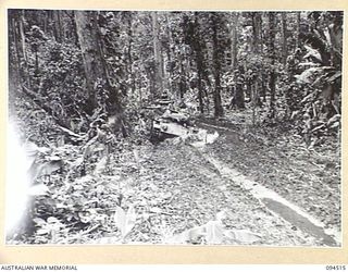 TOROKINA, BOUGAINVILLE, 1945-08-02. THE M24 GENERAL CHAFFEE LIGHT TANK FORGING AHEAD THROUGH MUD DURING TRIALS CONDUCTED FOR THE WAR OFFICE