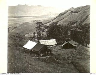 RAMU VALLEY, NEW GUINEA. 1944-03-27. RAMU VALLEY FROM THE SITE OF HEADQUARTERS, 15TH INFANTRY BRIGADE WITH ADMINISTRATIVE OFFICES IN THE FOREGROUND