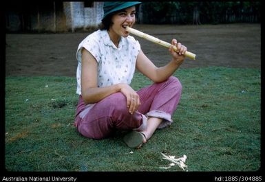 Diana Howlett eating sugar cane