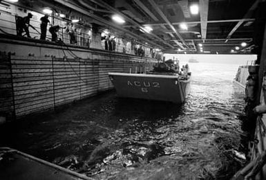 An LCM-8 is launched from the well deck of the amphibious assault ship USS SAIPAN (LHA-2) during NATO exercise Display Determination '81