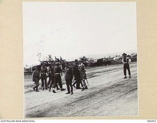 CAPE WOM, NEW GUINEA, 1945-09-13. LIEUTENANT-GENERAL H. ADACHI, COMMANDER 18 JAPANESE ARMY IN NEW GUINEA FORMALLY SURRENDERED TO MAJOR-GENERAL H.C.H. ROBERTSON, GENERAL OFFICER COMMANDING 6 ..
