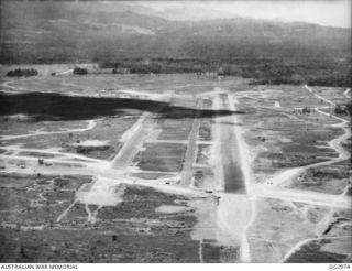 NADZAB, NEW GUINEA. 1944-02-15. AERIAL PHOTOGRAPH OF PARALLEL RUNWAYS AT ONE OF THE AIRSTRIPS AT THE ALLIED BASE