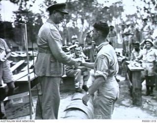 THE SOLOMON ISLANDS, 1945-01-12. A NEW ZEALAND PRIZE WINNER AT A COMBINED ANZAC SPORTS MEETING AT BOUGAINVILLE ISLAND. (RNZAF OFFICIAL PHOTOGRAPH.)