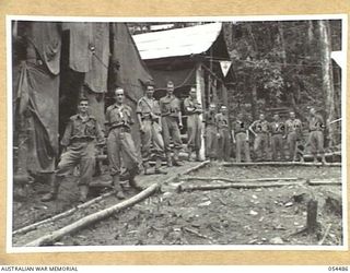 NEW GUINEA, 1943-07-20. TROOPS OF THE 2/6TH AUSTRALIAN INFANTRY BATTALION AT HOUSE BANANA STAGING CAMP. LEFT TO RIGHT:- VX36484 PRIVATE A.A. MCDONALD; VX53375 PRIVATE E. ENWRIGHT; VX54105 PRIVATE ..