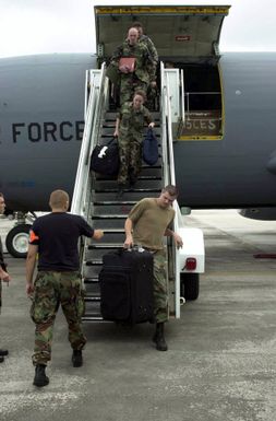 US Air Force (USAF) members with the 15th Civil Engineering Squadron (CES) from Hickam Air Force Base (AFB), Hawaii, arrive on Andersen Air Force Base (AFB), Guam, to help with the super-typhoon Pongsona recovery effort