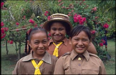 Three girls in 'Brownie' uniforms