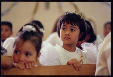 Milovale Tiatia follows the church service on White Sunday