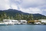Federated States of Micronesia, waterfront buildings and boats docked on shore of Weno Island in Chuuk State