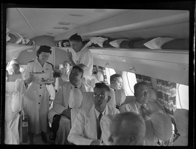 Hon Tupua Tamasese Mea'ole and other passengers on board aircraft, TEAL (Tasman Empire Airways Limited), Satapuala, Upolu, Samoa