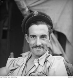 MILNE BAY, PAPUA. 1942-09. FLIGHT-LIEUTENANT V. SULLIVAN SERVING WITH 76 FIGHTER SQUADRON RAAF IN NEW GUINEA