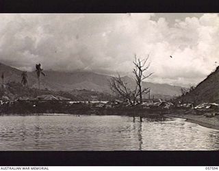 SALAMAUA AREA, NEW GUINEA. 1943-09-20. SHORELINE OF THE 42ND AUSTRALIAN INFANTRY BATTALION AREA OF THE ISTHMUS FROM THE SOUTH, IMMEDIATELY AFTER THE RECAPTURE FROM THE JAPANESE