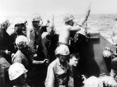 [Seabees and Engineering Unit in Amphibious Vehicle]