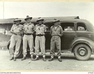 LAE BASE AREA, NEW GUINEA. 1944-12-27. OFFICERS FROM THE VARIOUS AUSTRALIAN ARMY, SALVAGE UNITS IN THE AREA. IDENTIFIED PERSONNEL ARE:- SX25703 MAJOR N. LERAY MEYER, COMMANDING OFFICER, 8TH SALVAGE ..