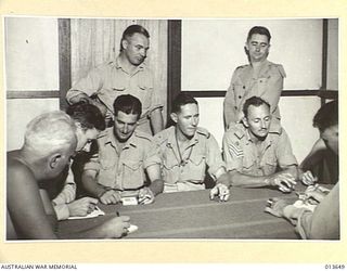 1942-11-23. THREE VICTORIAN A.I.F. SERGEANTS WHO ESCAPED FROM RABAUL WHEN THE TOWN WAS CAPTURED BY THE JAPANESE LAST JANUARY RECENTLY REACHED PORT MORESBY AFTER AN AMAZING 267 DAYS TRIP, DURING ..