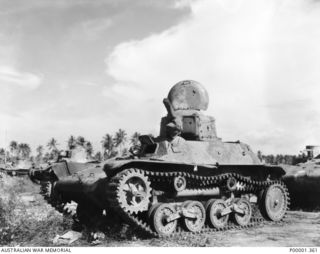JAPANESE ARMY TYPE 97 'TE KE' TANKETTE PARKED ON THE GAZELLE PENINSULA. (RNZAF OFFICIAL PHOTOGRAPH.)