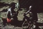 Two men talking at Ngarinaasuru