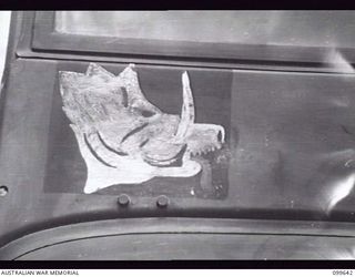 RABAUL, NEW BRITAIN, 1946-01-05. THE BOAR'S HEAD, TACTICAL SIGN OF 5 DIVISION