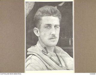 MILNE BAY, PAPUA. 1942-09. PILOT- OFFICER H.A. KERR, SERVING WITH NO. 76 FIGHTER SQUADRON RAAF IN NEW GUINEA