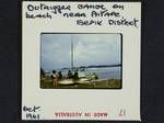 Outrigger canoe on beach near Aitape, Sepik District, Oct 1961