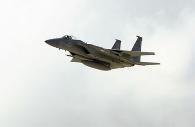 Aerial of a US Air Force (USAF) F-15 Eagle fighter, 67th Fighter Squadron (FS), Kadena Air Base (AB), Okinawa, enroute for a mission in support of Exercise COPE NORTH. COPE NORTH is an exercise where troops from the US Air Force (USAF), US Navy (USN), and US Marine Corps (USMC) Marines train with troops from the Japanese Air Self Defense Force (JASDF)