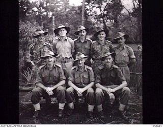SOGERI, NEW GUINEA. 1943-11-06. GROUP PORTRAIT OF OFFICER INSTRUCTORS OF THE NEW GUINEA FORCE TRAINING SCHOOL. LEFT TO RIGHT: FRONT ROW: QX6075 CAPTAIN (CAPT) E. P. JONES; VX7619 MAJOR N. F. ..