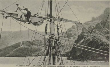 Clayton and Alexander furling the sails of the Cap Pilar at Nuka Hiva