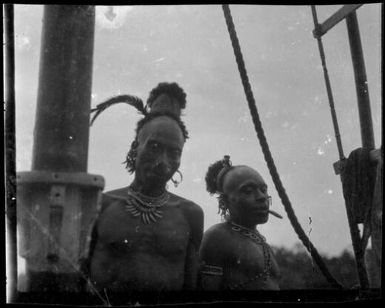 Two men with distinctive hair styles on the Balangot [?], Ramu River, New Guinea, 1935 / Sarah Chinnery