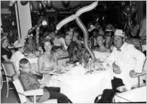 Jeff, Ginger, Amanda, and Johnny Mercer at dinner on a Hawaiian cruise