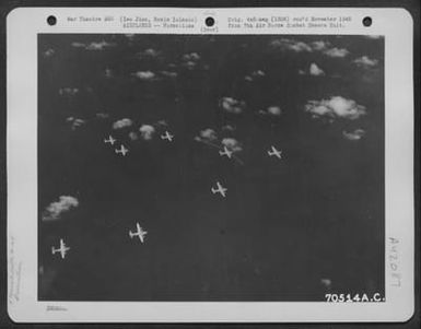 Consolidated B-24 "Liberators" Roar Over A Wide Expanse Of Water As They Head Toward Iwo Jima, Bonin Islands, For Another Strike On Jap Installations On The Tiny Island, Halfway Between Saipan And The Japanese Homeland. 21 October 1944. (U.S. Air Force Number 70514AC)