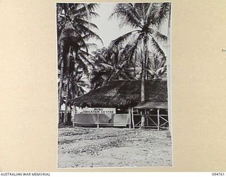 LAE AREA, NEW GUINEA, 1945-08-10. THE BUSU EDUCATION CENTRE HUT UNDER THE COMMAND OF THE DEPUTY ASSISTANT DIRECTOR OF EDUCATION, LAE BASE SUB-AREA