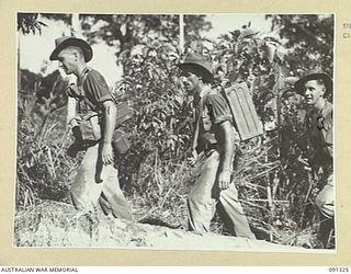 KARAWOP, AITAPE-WEWAK SECTOR, NEW GUINEA. 1945-04-29. A PATROL FROM A COMPANY, 2/1 INFANTRY BATTALION, AND 2/2 FIELD REGIMENT TROOPS, IN THE JUNGLE