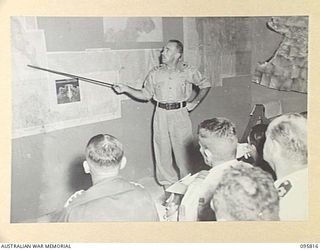 JACQUINOT BAY, NEW BRITAIN. 1945-09-07. FOLLOWING THE SURRENDER OF JAPANESE FORCES IN THE SOUTH WEST PACIFIC AREA, STAFF OFFICERS, ROYAL NEW ZEALAND AIR FORCE OFFICERS AND ROYAL AUSTRALIAN NAVY ..