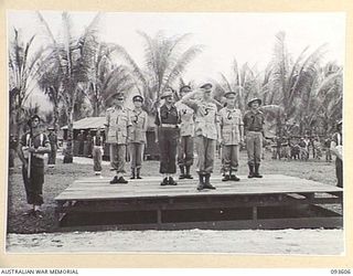 JACQUINOT BAY, NEW BRITAIN, 1945-07-01. HIS ROYAL HIGHNESS, THE DUKE OF GLOUCESTER, GOVERNOR-GENERAL OF AUSTRALIA (5), TAKING THE SALUTE FROM TROOPS OF HEADQUARTERS 4 INFANTRY BRIGADE, HEADQUARTERS ..