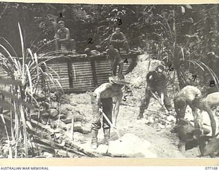 MALMAL MISSION, JACQUINOT BAY, NEW BRITAIN. 1944-11-24. TROOPS OF NO. 2 PLATOON, 12TH FIELD COMPANY, BUILDING A SMALL DAM IN THE PALMALMAL PLANTATION TO SUPPLY WATER TO HEADQUARTERS, 5TH AUSTRALIAN ..