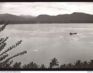 MOROBE, NEW GUINEA. 1943-08-13. THE HARBOUR, AS SEEN FROM THE BOFORS GUN STATION L3, OF THE 162ND AUSTRALIAN LIGHT ANTI-AIRCRAFT BATTERY