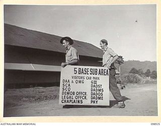 RABAUL, NEW BRITAIN. 1945-11-16. THE BASE SIGNBOARD READY FOR ERECTION IN THE GROUNDS OF HEADQUARTERS 5 BASE SUB AREA