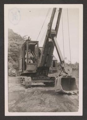 [Henry J. Cates Jr. Inside Excavator]