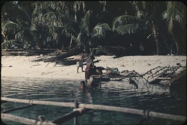 Mother and daughter returning from the garden island (3) : Mortlock Islands, Papua New Guinea, 1960 / Terence and Margaret Spencer