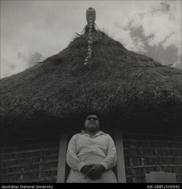 Man in the doorway of a house