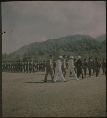 Governor General inspecting assembled police, Rabaul, New Guinea, 1937 / Sarah Chinnery