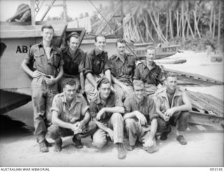SORAKEN AREA, BOUGAINVILLE, 1945-06-12. MEMBERS OF 42 LANDING CRAFT COMPANY WHO PLAYED A HEROIC PART IN EVACUATING 31/51 INFANTRY BATTALION TROOPS FROM THE BEACH AT PORTON PLANTATION. IDENTIFIED ..