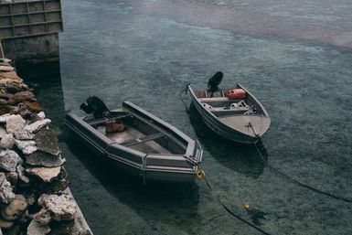 Two boats on water, Fakaofo, Tokelau