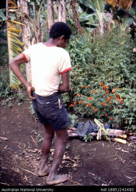 Boy fixing his clothing