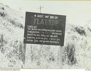 GUSIKA, NEW GUINEA. 1944-03-31. ONE OF MANY BATTLE SIGNS MARKING CONTACT WITH THE ENEMY, THIS SIGN AT 'FLAT-TOP', BETWEEN GUSIKA AND KILIGIA RECORDS ACTIVITIES OF THE 22ND AND 29TH/46TH INFANTRY ..