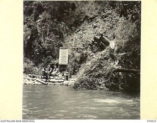 ZENAG, NEW GUINEA, 1944-02-27. TX3078 SAPPER B.T. COCKING (1), IN A "ONE AND A HALF DIVE"AT A SPORTS CARNIVAL IN A CREEK DAMMED BY MEMBERS OF THE 2/9TH FIELD COMPANY, ROYAL AUSTRALIAN ENGINEERS. ..