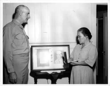 A mother receiving her son's Silver Star
