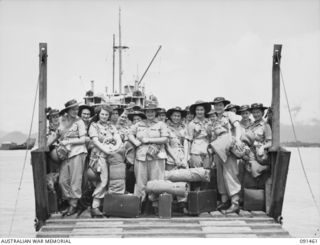 LAE, NEW GUINEA, 1945-05-07. AWAS PERSONNEL DISEMBARKING FROM THE MV DUNTROON, ABOUT TO LEAVE A LANDING BARGE AT MILFORD HAVEN. THEY ARE PART OF A GROUP OF 342 AWAS FROM AUSTRALIA EN ROUTE TO THE ..